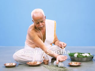 Man performing Shraddha rites for his departed ancestors, Hindu Dharma, funeral rites and rituals