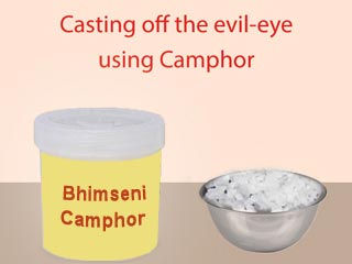 Method of casting off the evil-eye using Camphor